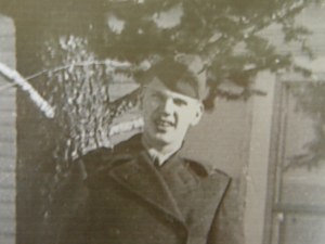 I don't know who took this picture of Bud in front of his house in Kalispell, probably in the winter of 1943 or early 1944.